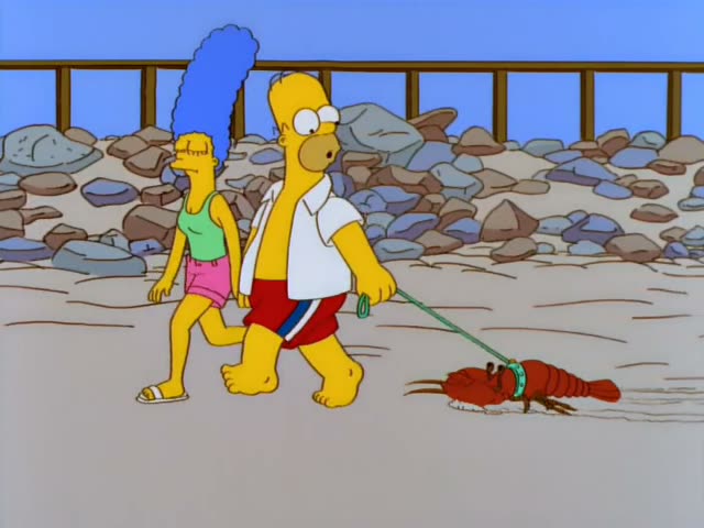 Homer and Marge walk along a rocky beach while Homer leads a red lobster on a green leash