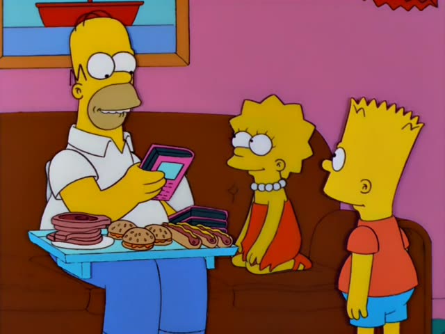 Homer holds a tray of sandwiches, cookies and hot dogs while standing in a living room with a pink wall and a framed…