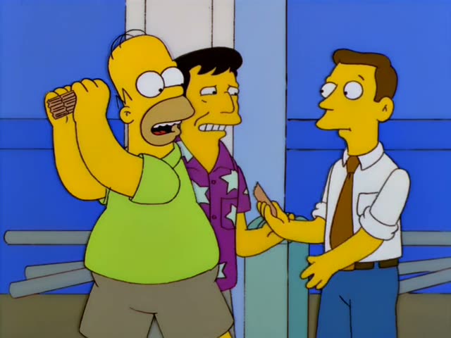 Homer Simpson and a stranger with black hair and a purple shirt covered in white stars stand together in front of a blue…