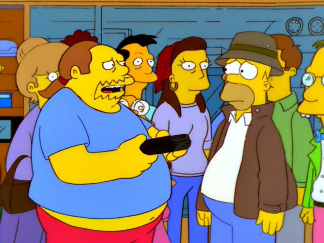 Krusty the Clown is in a crowd with Homer in a brown jacket and tan hat, a man in a green coat holding a small recorder…