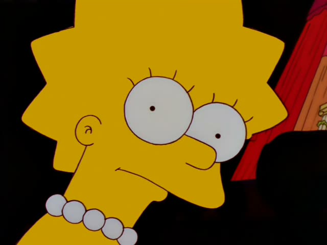 Lisa Simpson sits in the dark in the foreground of a theater, first with wide eyes and then with a clenched, gritted-teeth…