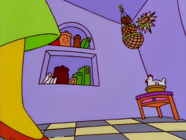 Maggie clutches a spotted giraffe toy in a blue outfit beside a small pink table