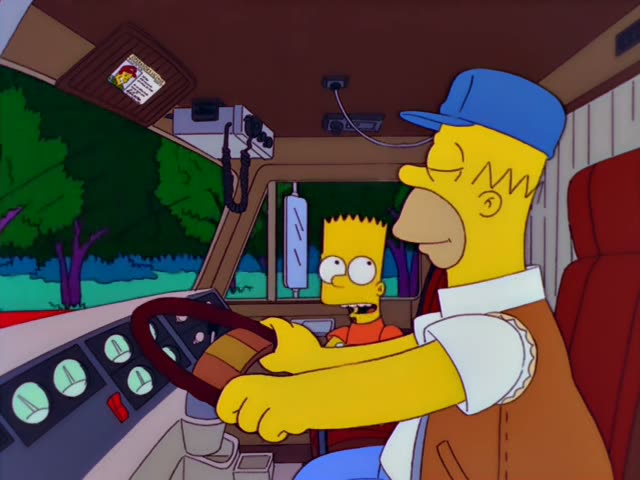 Homer grips the steering wheel of a truck cab while Bart sits beside him, and Homer glances up at an operator's license…
