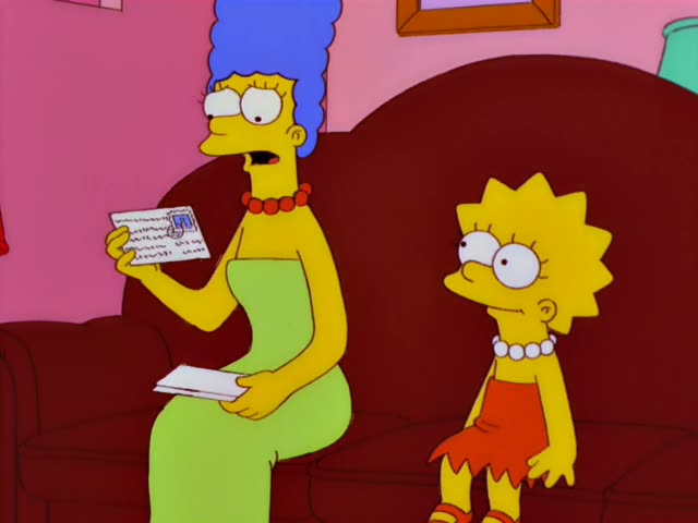 Marge sits on a dark red couch in a pink room, holding an open postcard in one hand and an envelope in the other, while Lisa…