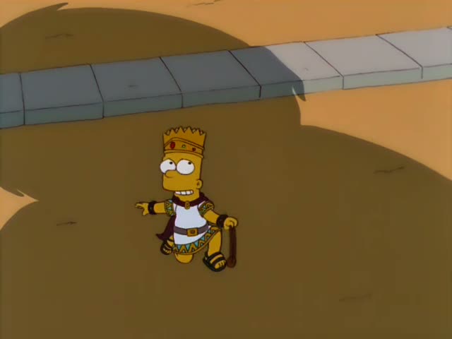 Bart and Nelson stand in a sunlit sandy arena lined with robed onlookers